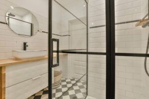 Bathroom with white tiled walls image